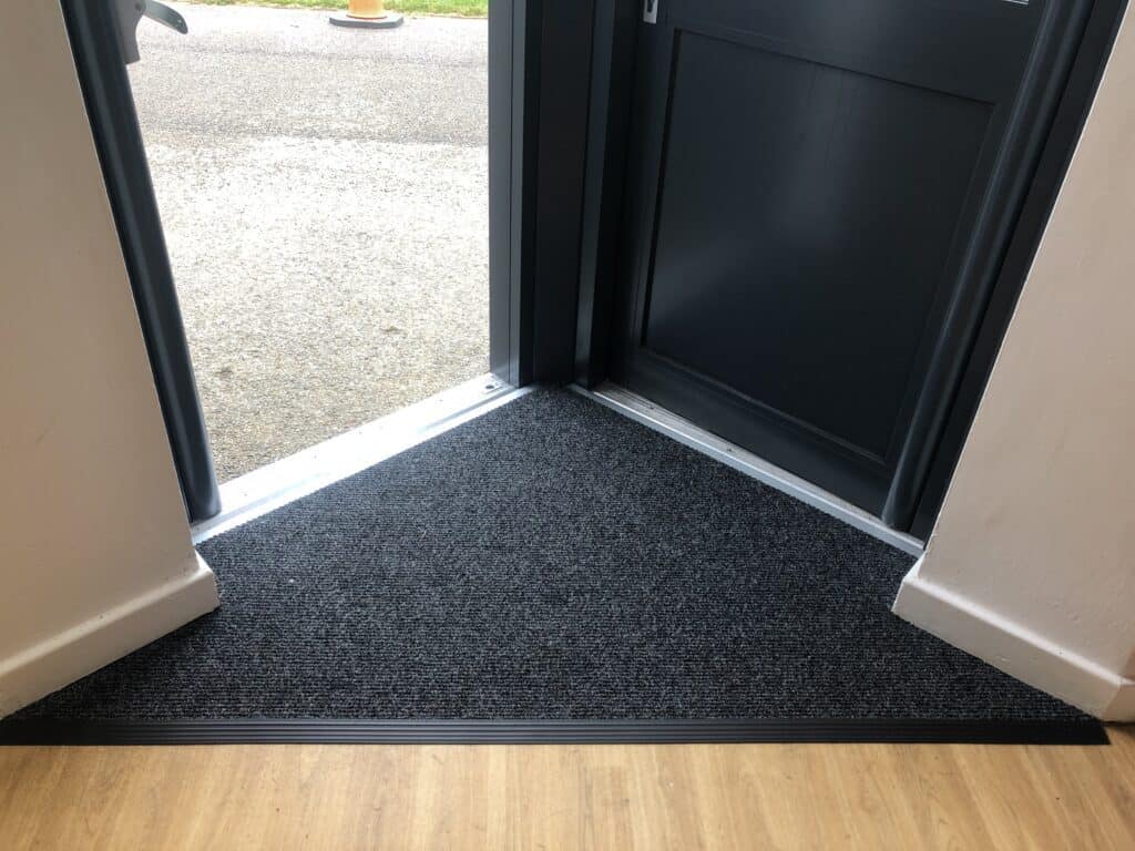 A photo of commercial entrance matting installed by Sussex Vinyl Flooring