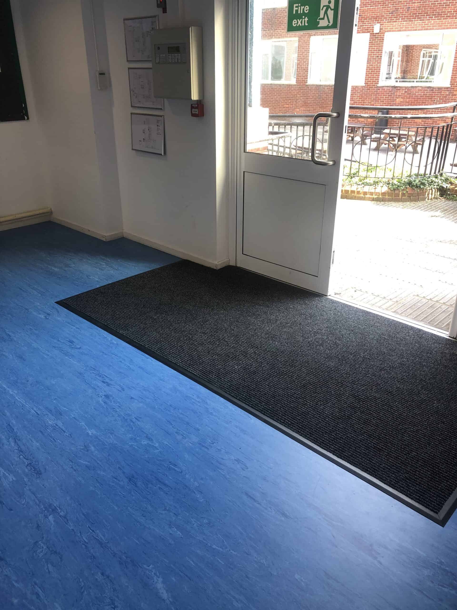 A photo of commercial entrance matting installed by Sussex Vinyl Flooring